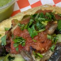 El Verde Es Vida · Vegan. Seasonal vegetables, onions, spices, and handmade corn tortilla. (Two tacos)