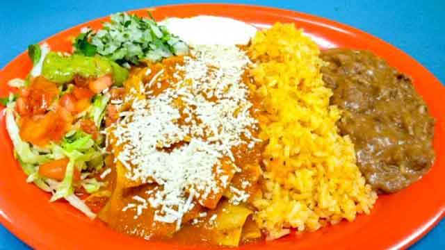 Chilaquiles · Delicious pieces of corn tortilla seasoned with spicy red sauce, topped with sour cream, cheese. Served with our classic rice, and signature.