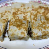 Quesadilla Large (Grande) · Delicious, melted, Monterey cheese in a big, 12