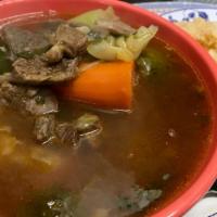 Caldo de Res · Mouth-watering beef stew with delicious vegetables. Served with rice, and warm.