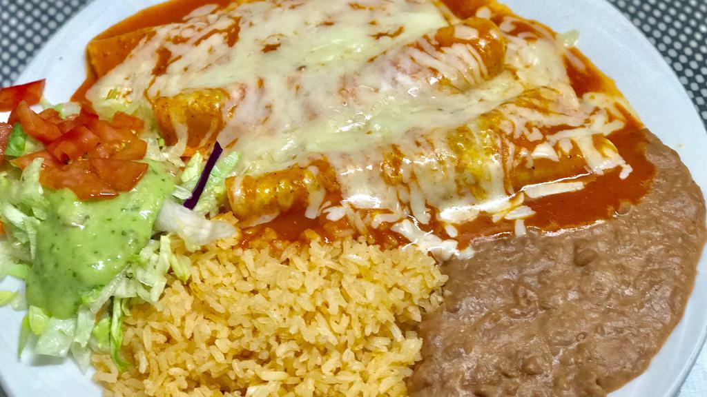Cheese Enchiladas · 3 cheese enchiladas bathed in our house made enchilada sauce with melted cheese on top served with rice, beans, and salad.