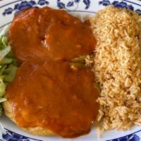 Chiles Rellenos · 2 HUGE breaded, bell peppers stuffed with cheese and smothered with our special sauce. Serve...