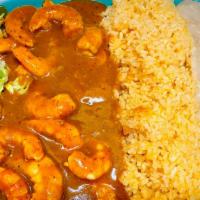 Camarones Rancheros · Grilled shrimp sautéed in our spicy, 