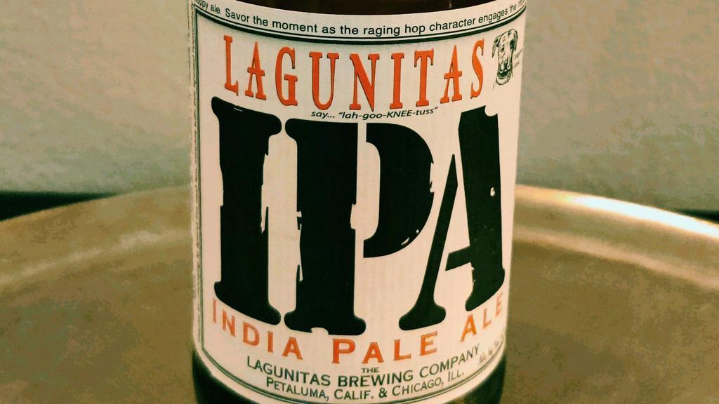 Lagunitas IPA Indian Pale Ale - 12oz bottle · Works with all Firepies, best with our Pepperoni or Chorizo. A well-rounded, Highly drinkable India Pale Ale. A bit of Caramel Malt barley provides the richness that mellows out the twang of the hops, including Cascade, Centennial, Chinook and a splash of honorary “C” hop, Simcoe.