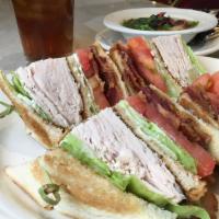 Club House · Triple decker classic with turkey, bacon, lettuce, tomato and mayo on any toast.