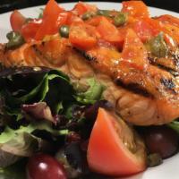 Salmon Salad · Broiled salmon (10 oz) served on a bed of spring mix greens, cucumbers, grapes and cranberri...