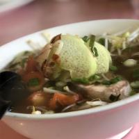 77. Canh Chua Hải Sản / 海鲜酸汤 · Seafood hot & sour soup (Shrimp, Squid & Fish ball) (Bean sprout, celery, pineapples, tomato).