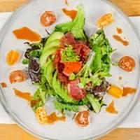 Spicy Maguro Salad · Akami tuna, avocado, English cucumber, spring mix, and scallion with house kimchi spicy dres...