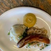 Bratwurst Plate · German sausage served along with potato salad and choice of red cabbage or sauerkraut.