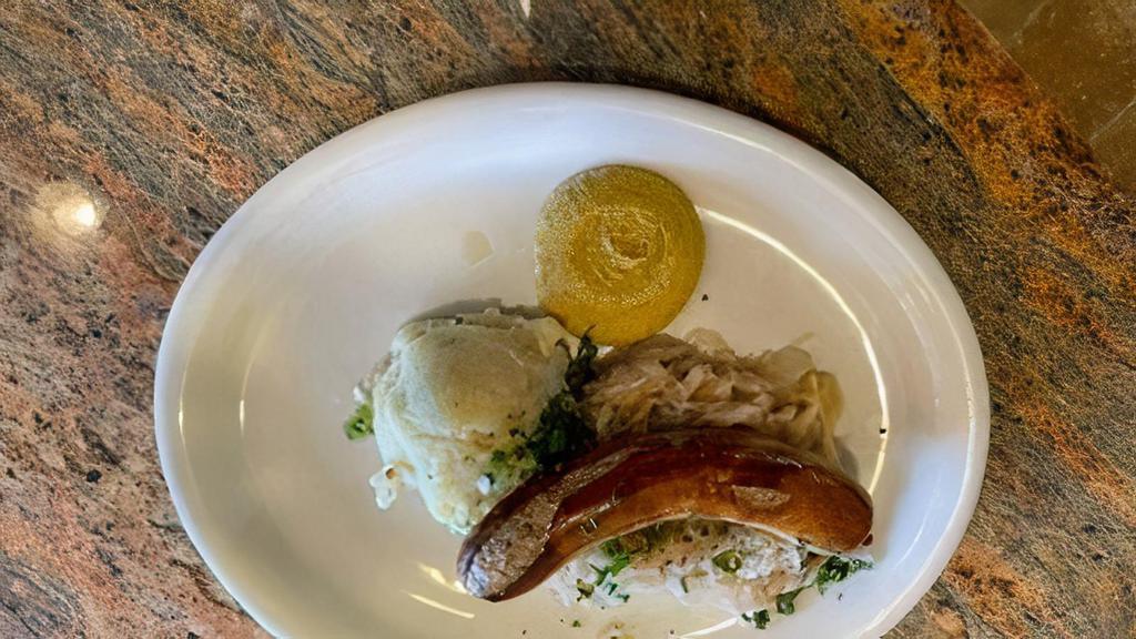 Bratwurst Plate · German sausage served along with potato salad and choice of red cabbage or sauerkraut.