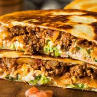 The Gyro Quesadilla · Thinly sliced, seasoned gyro meat and loads of our melty cheese blend, folded in a large, so...