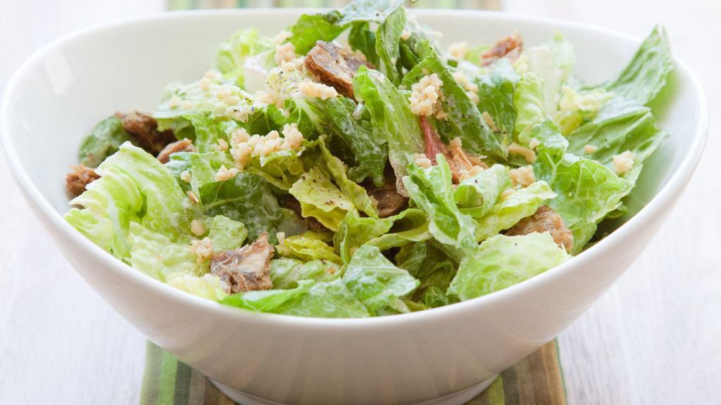 Caesar Salad · Fresh, crisp romaine lettuce, toasted croutons, parmesan cheese and tasty Caesar dressing on top.