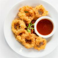 Fried Calamari · Tender calamari, battered and fried to golden perfection.