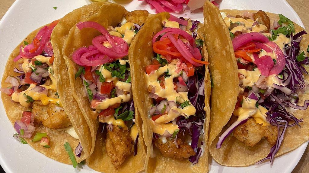 Fish Taco · Beerbatter fried fish topped with pico de gallo, cavage ,chipotle aoili and sour cream