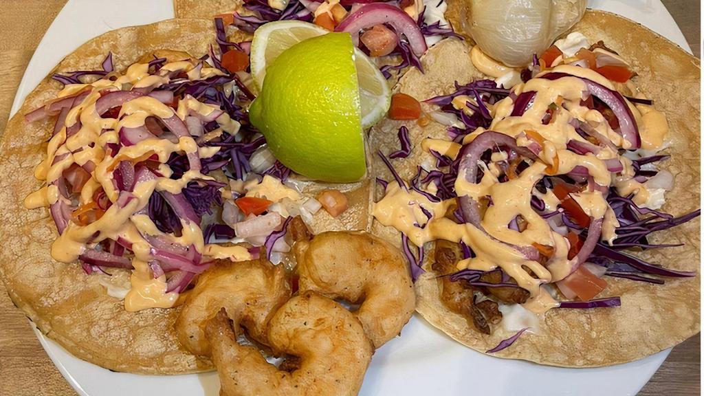 Shrimp Taco · Beerbatter fried Shrimp topped with pico de gallo, cavage ,chipotle aoili and sour cream