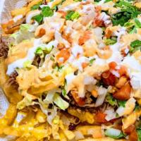 Loaded Fries · Fries, nacho cheese, creme, lettuce, chipotle aoili, pico de gallo and choice of your meat.
...