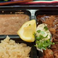 Birria Plate · Shredded beef plate which includes rice, beans and tortillas.