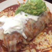 Burrito De Chile Relleno · Chile relleno, rice and beans stuffed in a flour tortilla and topped with cheese and tomato ...