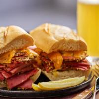 Regular Pastrami Sandwich · A classic sandwich with lean pastrami, yellow mustard, lettuce, tomato and crisp pickles on ...