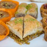 Baklava · Rolled phyllo baklava with cashew nut and topped with pistachio