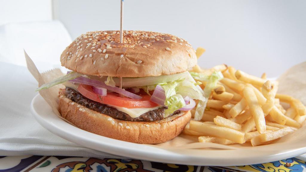 Cheese Burger · Beef patty topped with American cheese, lettuce, tomato, onion, mayonnaise and toasted white buns.