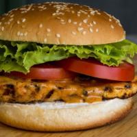 Grilled Chicken Burger · Seasoned chicken breast meat topped with American cheese, lettuce, tomato, onion, mayonnaise...