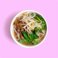 Filet Mignon Pho · Filet mignon in beef broth garnished with onion, scallion, cilantro, and a side of bean spro...