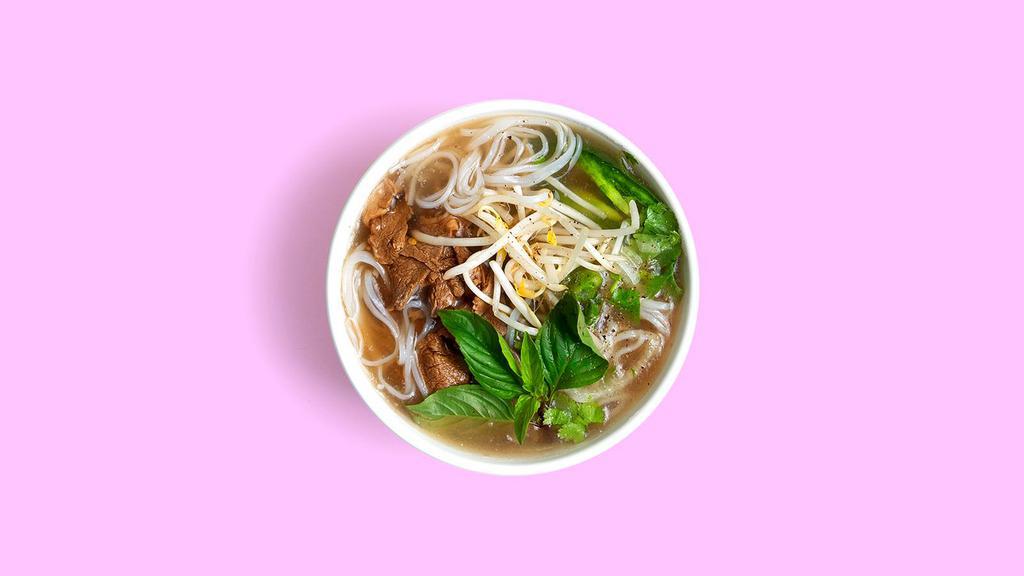 Filet Mignon Pho · Filet mignon in beef broth garnished with onion, scallion, cilantro, and a side of bean sprouts, Thai basil, jalapeño.