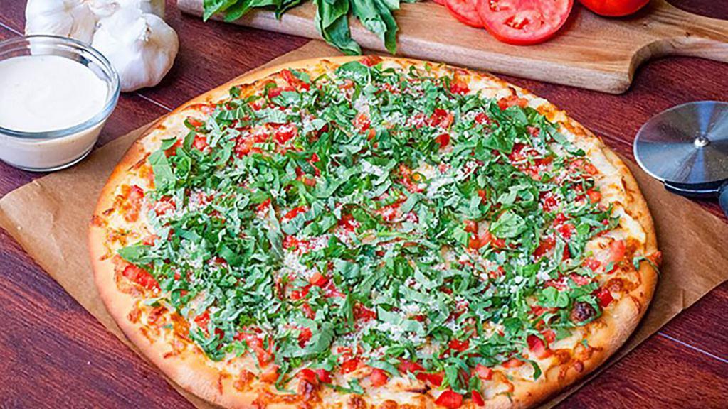 #13 Grilled Chicken Bruschetta · A thin crust pizza, creamy garlic sauce, grilled chicken, diced tomatoes, fresh basil and parmesan cheese.