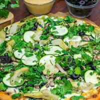 #23 Veggie Gourmet · A thin crust pizza, smokey cream sauce, mushrooms, black olives, spinach, zucchini, artichok...