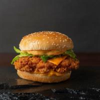 Original Crispy Chicken Sandwich · Crispy, battered, golden fried chicken patty with fresh lettuce, tomato slices, pickles and ...