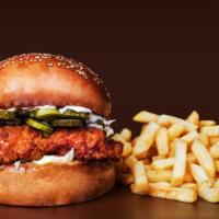 BBQ Crispy Chicken Sandwich · Crispy, battered, golden fried chicken patty smothered in sweet and smoky BBQ sauce. Served ...