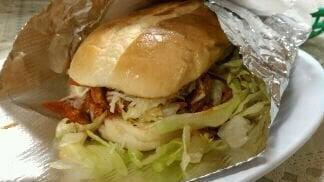 Torta Loca · Choice of meat, bell peppers, onions, and melted cheese.