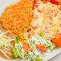 Enchiladas Plate · Choice of meat, three enchiladas topped with red sauce and melted Monterey Jack cheese.