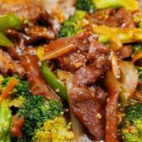 Beef Broccoli · USDA steak cooking with assorted Vegetables in brown sauce.