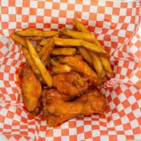 3. Buffalo Chicken Wings · Seasoned Right, Golden Fried, and Always Served Fresh. 6 pcs.
And fries