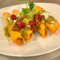 Mama Ana's Chicken & Potato Taquitos · Eddie may have borrowed this recipe from his mother in law, Salsa verde, guacamole, queso fr...