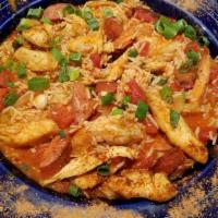 New Orleans Jambalaya · Created by the Cajuns when food was scarce. Andouille sausage, chicken, prawns, peppers, oni...