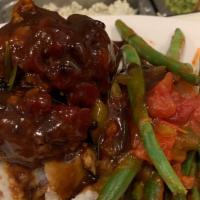 Mama's Meatloaf · A timeless iconic dish popular during the depression, WW2 and today, garlic mashed potatoes,...