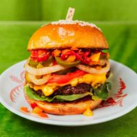 Spicy Pepper Burger · Juicy cheeseburger with chopped peppers, tomato, lettuce, onions and sriracha sauce.