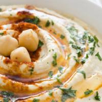 Vegan Hummus with Pita · Creamy garbanzo beans mixed with sesame sauce and garlic.