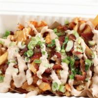 The Dirty Deed Fries · Our signature fries with melted cheddar cheese, grilled onions, chives, butchers cut bacon, ...