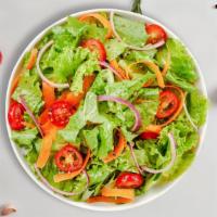 Mixed Greens Salad · Iceberg lettuce, bell peppers, red onions, black olives, fresh Roma tomatoes, mozzarella che...