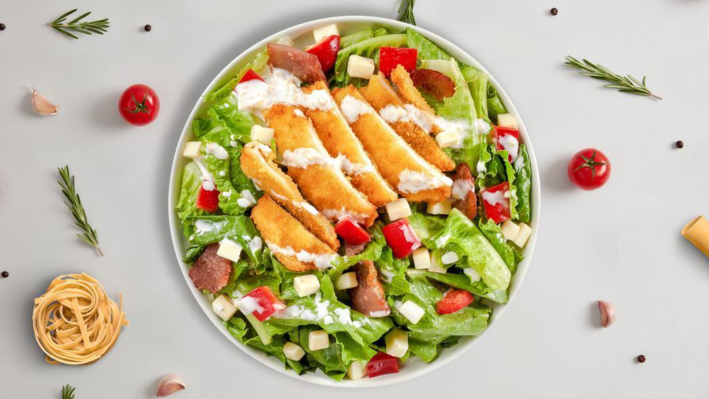 Chunky Chicken Salad · Iceberg lettuce, crispy chicken tenders, red onions, fresh Roma tomatoes, cheddar cheese, mozzarella cheese, seasoned croutons, bell peppers, and black olives tossed with your choice of dressing.