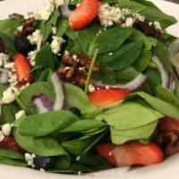 Greek Salad · Spinach, feta cheese with fresh basil, dried cranberries, tomatoes and balsamic vinaigrette ...