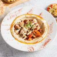 Hummus Bowl with Chicken Thigh (GF) by Oren's Hummus · By Oren's Hummus. Hummus topped with chopped chicken thigh and tahini. Served with 2 pita. C...