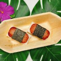 Spam Musubi (2 Pc) · An island classic composed of a slice of grilled spam on rice, wrapped in dried seaweed