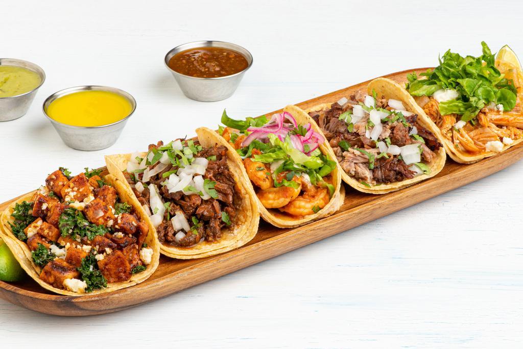 Five Tacos · Choice of five tacos.  All tacos served with three signature salsas.