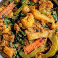 Mixed Vegetable Masala · Vegan, gluten free. Mixed vegetables, onions, tomatoes, ginger and spices.
