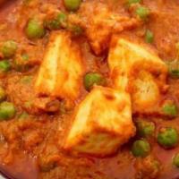 Mattar (Peas) Curry · Vegan, gluten free. Peas, spice blend, tomato - onion sauce.